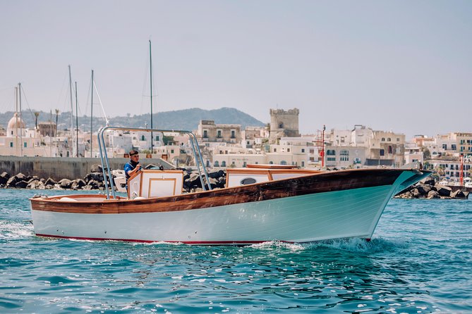 Boat tour of the island of Ischia with a typical Ischia 10-metre launch full day - Lacco Ameno’s mushroom-shaped rock