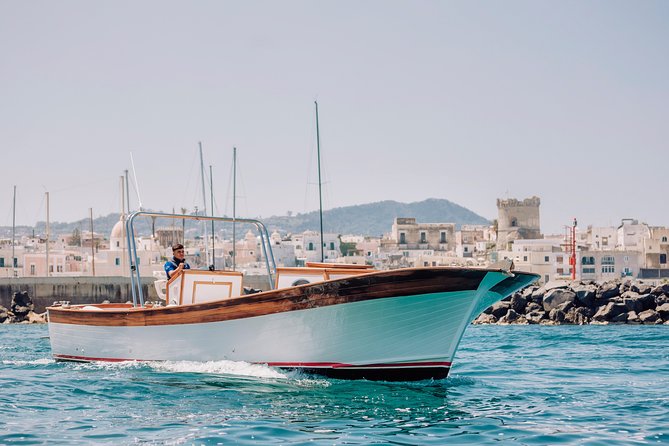 Boat tour of the island of Ischia with a typical Ischia 10-metre launch full day - Swimming, snorkeling, music, and the pace of the day