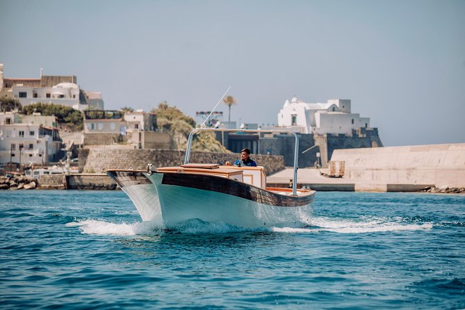 Boat tour of the island of Ischia with a typical Ischia 10-metre launch full day - Sorgeto Bay and Ischia’s thermal waters