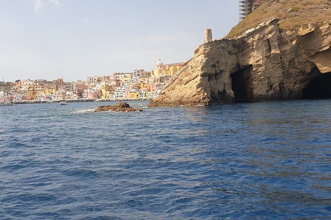Boat tour with lunch on board to discover Procida - Spiaggia degli Inglesi and the northern coast