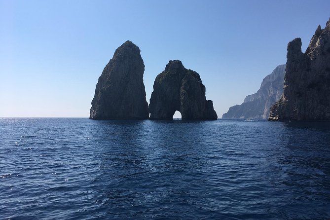 Capri and Blue Grotto by Gozzo Boat and Anacapri from Naples - A two-hour cruise past caves and the Faraglioni