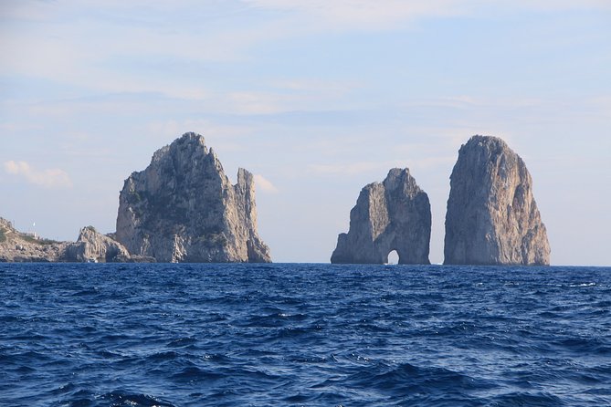 Capri Private Boat Stress Free Tour from Naples or Sorrento - Faraglioni rocks from the sea