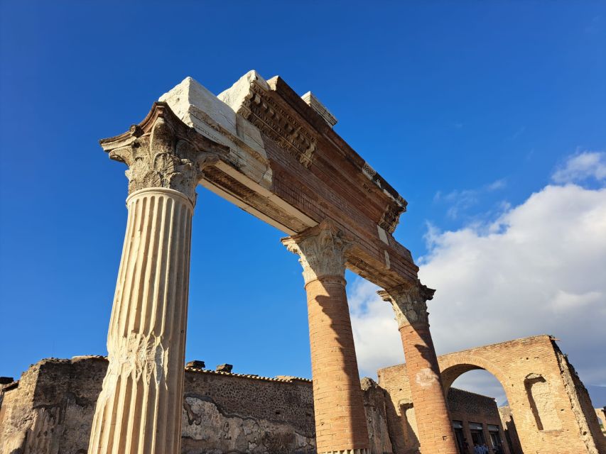 Day Trip to Pompeii & Vesuvius from Naples - Hiking the red, dusty trail on Vesuvius