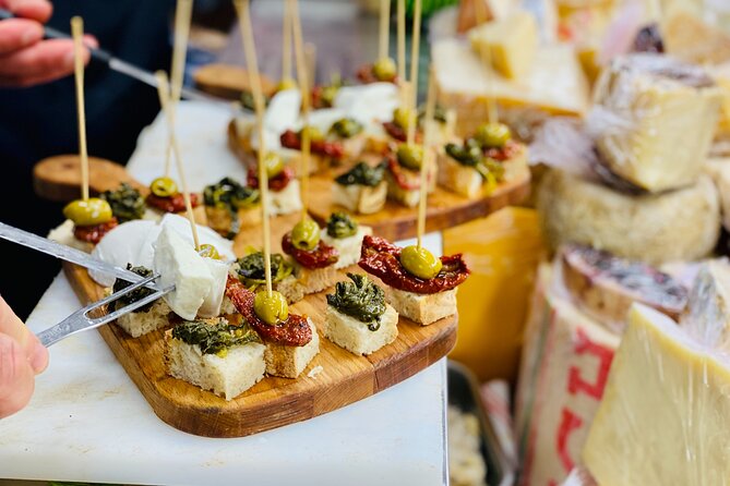 Flavors of Naples Decumani Street Food and Sightseeing Tour - Starting among Greek walls at Piazza Bellini
