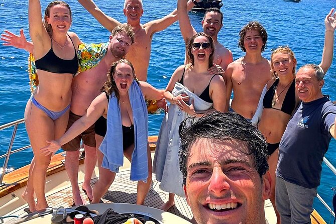 From Castellammare di Stabia: Capri Blue Grotto Boat Day Tour - Swimming, drinks, and the onboard setup