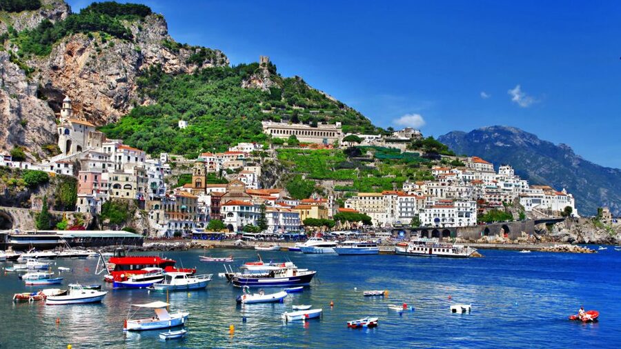 From Naples: Amalfi Coast Highlights Tour by Car and Boat - The boat ride shows the coast from its best side
