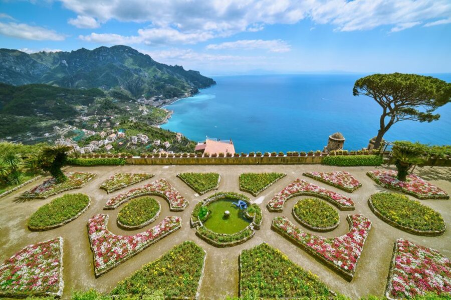 From Naples: Amalfi Coast Tour – Positano, Amalfi & Ravello - Positano’s stairs, shops, and seaside tables