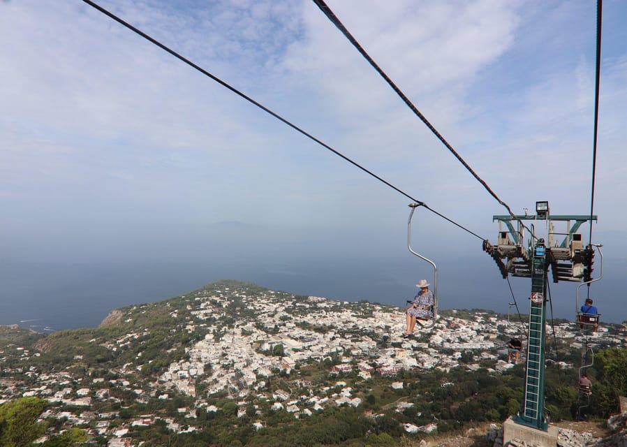 From Naples: Blue Grotto, Capri, and Anacapri Group Tour - Capri town, the Piazzetta, and Via Camerelle