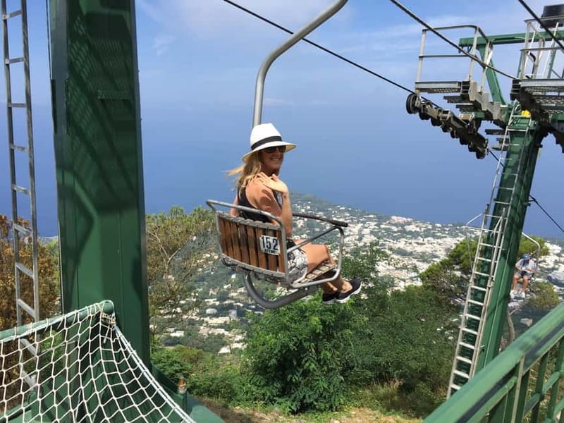 From Naples: Complete Capri Guided Boat and Bus Tour - The one-hour gozzo cruise