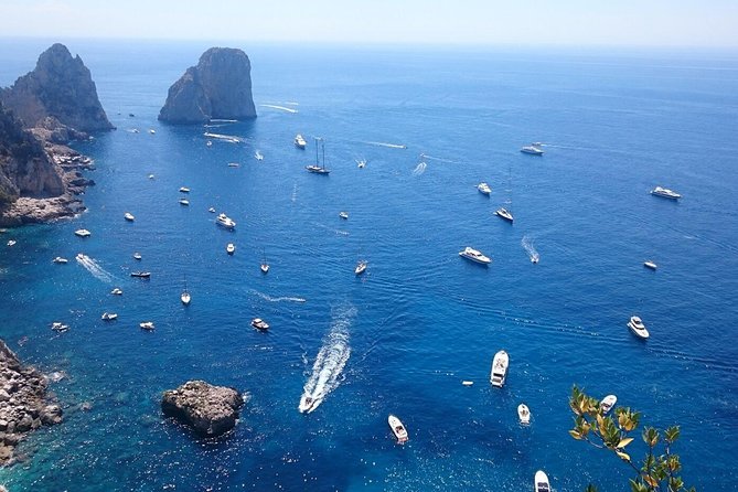 From Naples: Full-Day Capri Island and Blue Grotto Tour - Meeting the guide at Molo Beverello