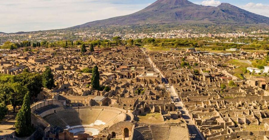 From Naples: Guided Pompei & Mount Vesuvius with Pizza Lunch - Walking through Pompeii in a two-hour visit