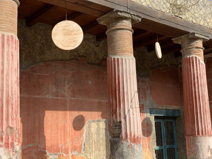 Herculaneum: Tickets & Tour with a Local Archaeologist - Casa dei Cervi and the view of Roman comfort