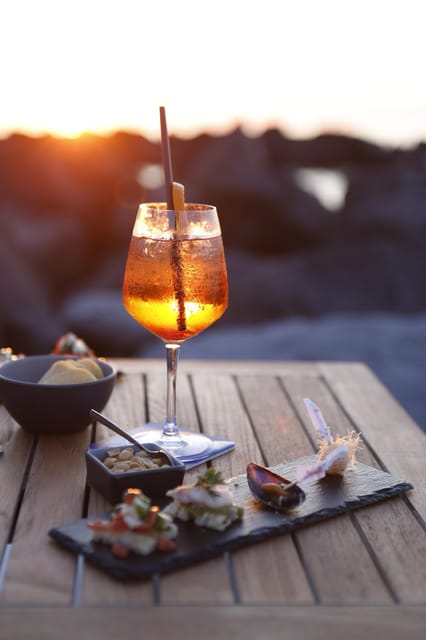 Italian aperitif at the sunset by the sea - What arrives at the table