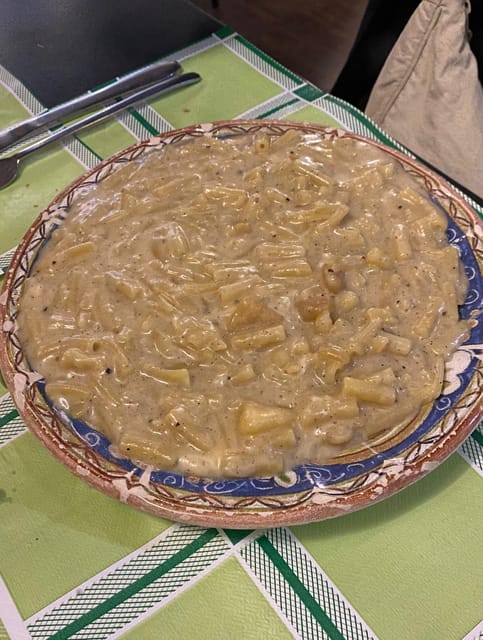 Naples: Authentic Family Home Lunch with Music Show & Spanish Quarters Tour - Stories that continue after the plates arrive