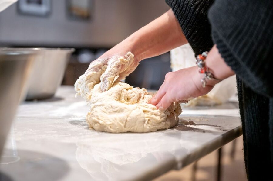 Naples: Authentic Neapolitan Pizza Making Class - Stretching, topping, and making your own pizza