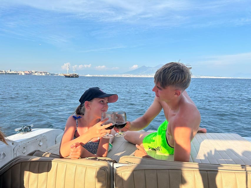 Naples: City Boat Tour with Aperitif - The swimming stop depends on the sea