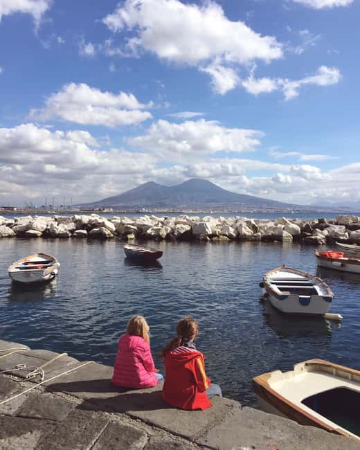 Naples: Evening Sightseeing with Gourmet Dinner - Castel Nuovo and the road toward the waterfront
