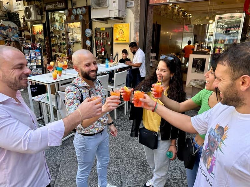 Naples: Old City Center Street Food Tour with Spritz - Starting among Greek ruins at Piazza Bellini