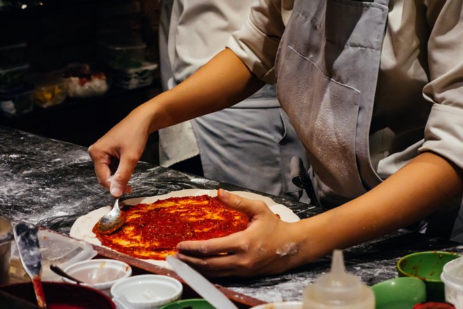 Naples Pizza-Making: From Dough to Dessert & Wine at Pizzeria - Building a classic Margherita at your station