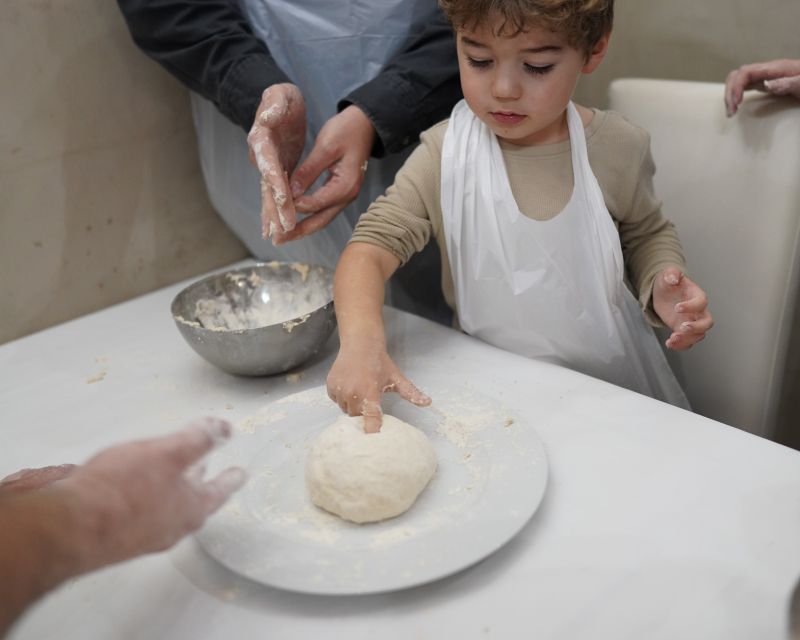 Naples: Pizza-Making Workshop with Drink and Appetizer - Eating your own pizza with a drink