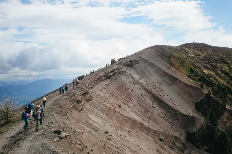 Naples: Pompeii and Vesuvius Day Trip - Walking toward the crater of Vesuvius