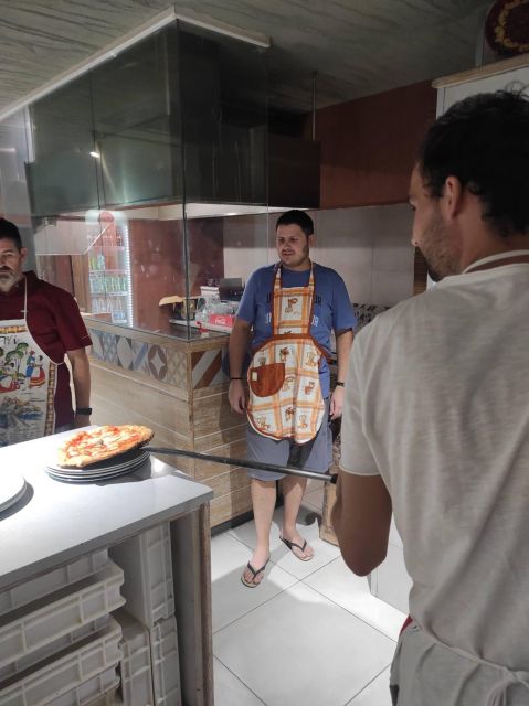 Naples: Small Group Pizza Making with Drink Included - Choosing toppings without losing the balance