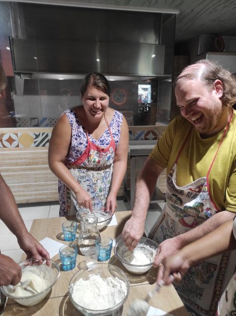 Naples: Small Group Pizza Making with Drink Included - Watching your pizza go into the oven
