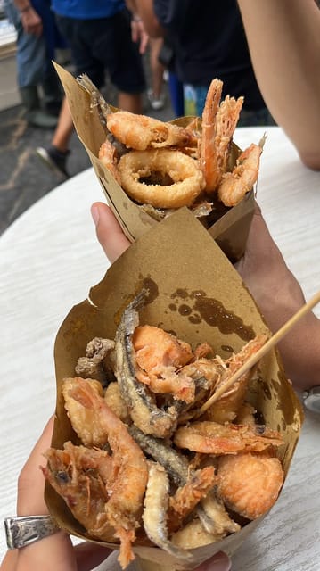 Naples: Street Food Experience With 6 Stops - A warm tarallo from a historic bakery