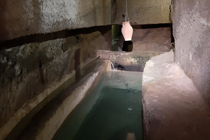 Naples Underground Official Skip-the-line Ticket - The narrow passage and the candle-lit option