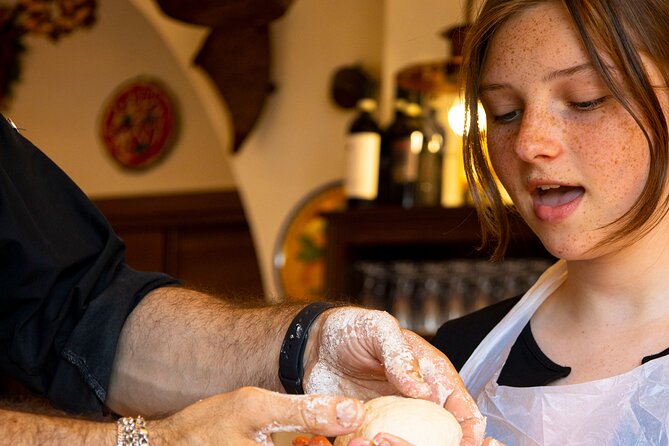 Pizza and Tiramisù Making class - Spreading the dough and making the sauce