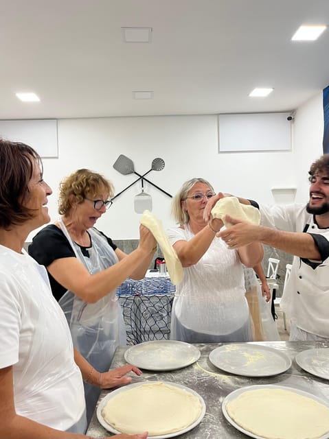 Pizza-Making Workshop by night with glass of wine - Stretching, Topping, and Firing Your Margherita