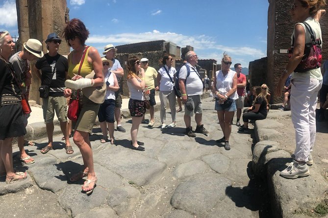 Pompeii and Vesuvius Small Group Tour From Naples with Pizza - Heat, crowds, and the uneven streets