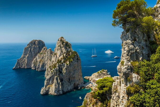Private Boat Tour from Naples to Capri Onboard Tornado 50 - Faraglioni Rocks, Natural Arch, and Villa Malaparte