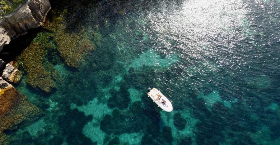 Procida: Boat Tour with Swimming Stops and Underwater Photos - The two-hour route around the island